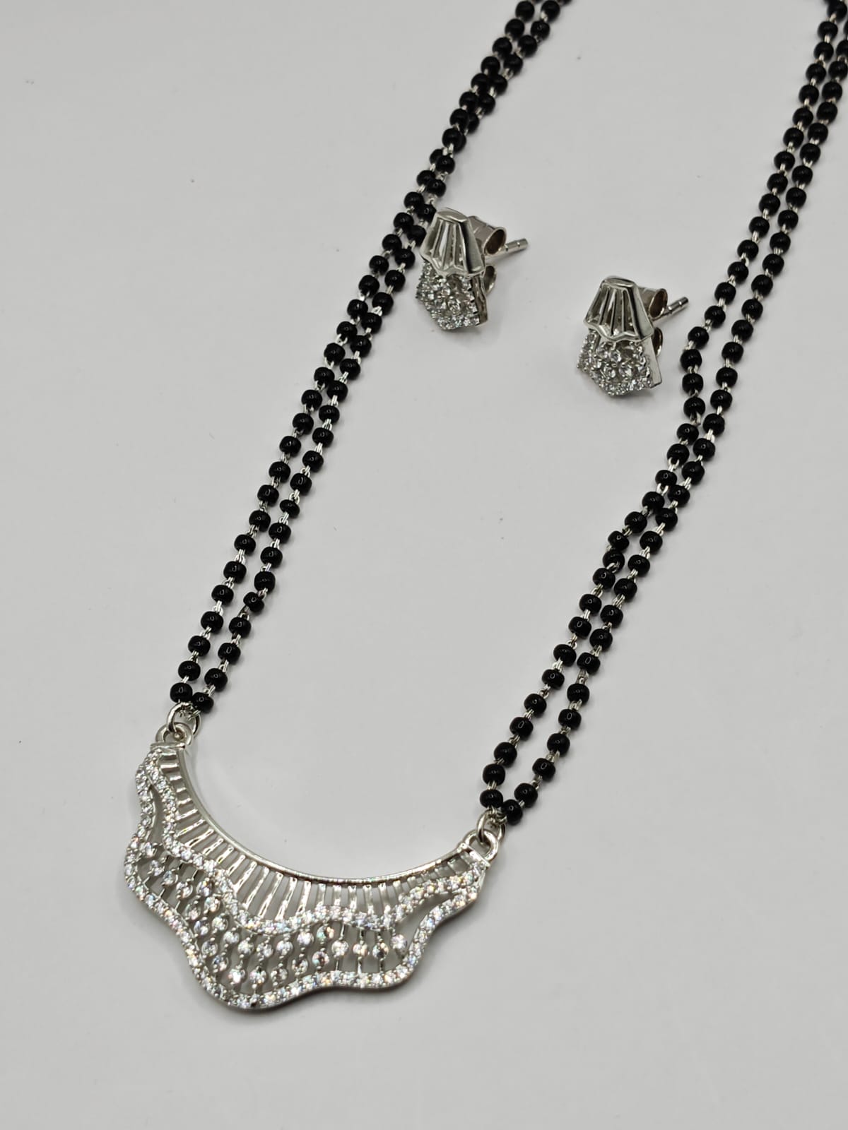Stylish CZ Diamond Mangalsutra with Matching Earrings