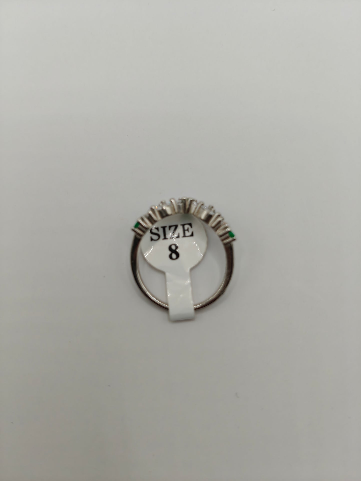 Elegant Silver Ring with Emerald Green and Clear Stones