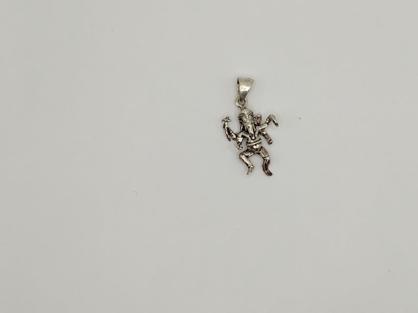 Silver Dancing Ganesha Pendant – Spiritual & Artistic Design